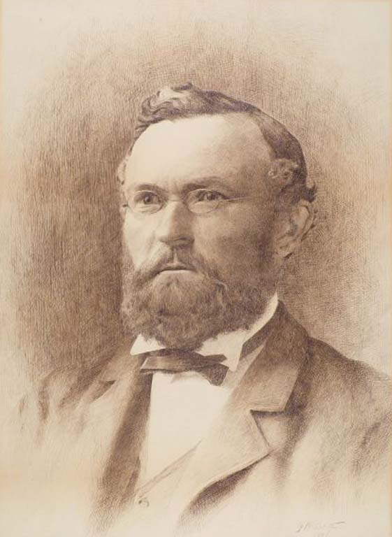 Image noir et blanc d'un homme portant barbe et lunettes