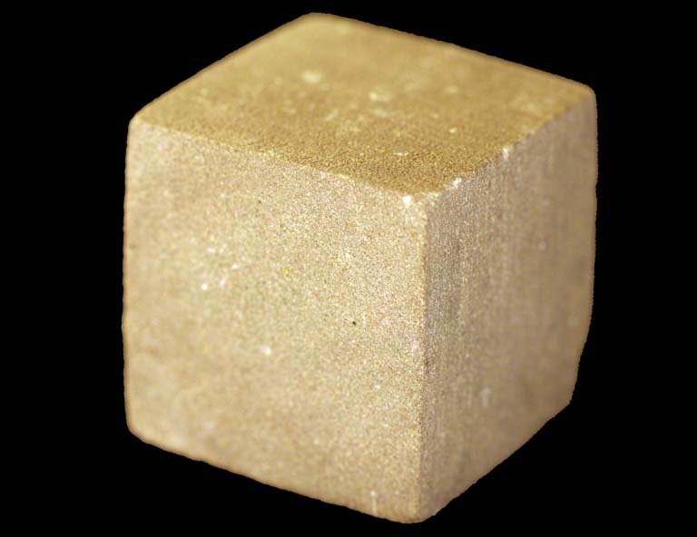 Photographie couleur d’un cube de grès brun