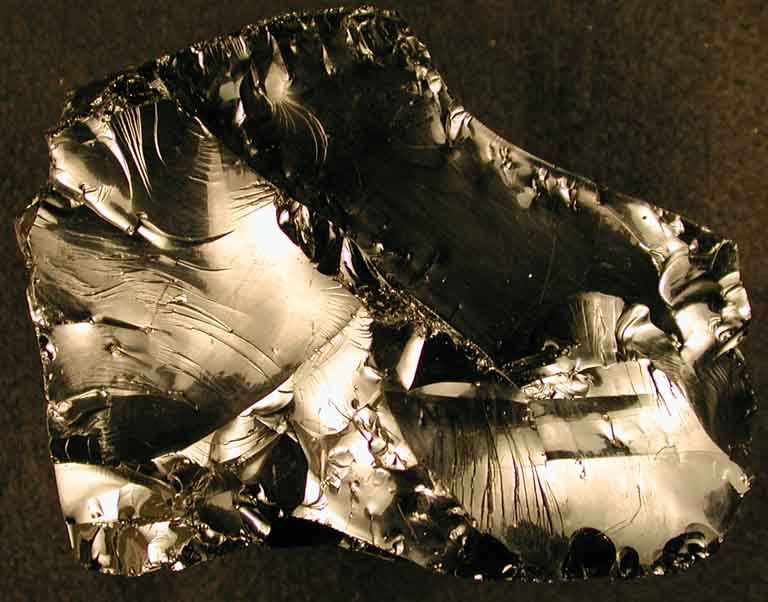 Colour image of black rock with high level of sheen