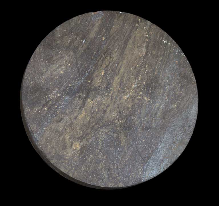 Colour image of circular brown rock