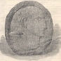 Black and white print of round stone with carved face in profile