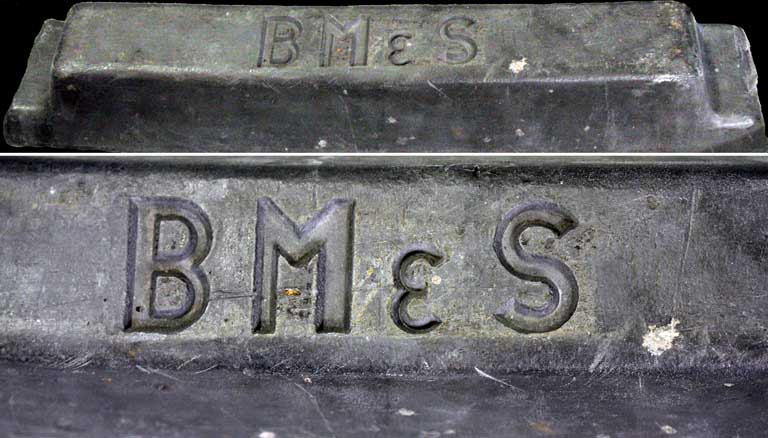Colour image of lead block stamped BM & S