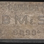 Colour image of lead block stamped BM &amp; S