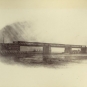 Black and white photograph a train bridge
