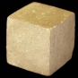 Colour photograph of a brown sandstone cube